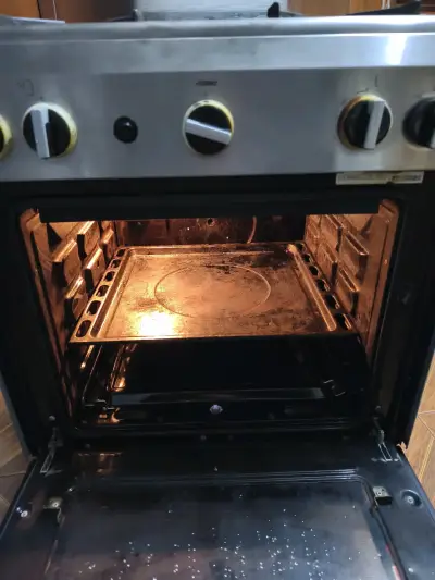 Cocina a gas de 4 quemadores con horno - miniatura 3