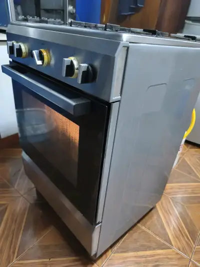 Cocina a gas de 4 quemadores con horno - miniatura 5