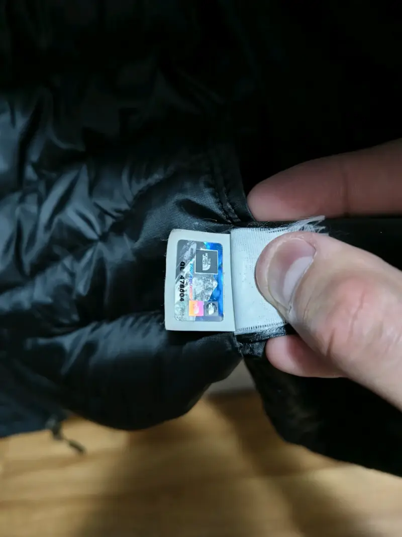 Chaqueta The North Face negra de plumas S - 6