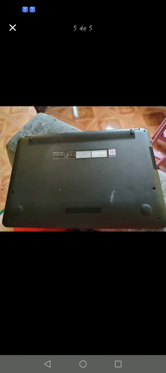 Laptop ASUS VivoBook 15 con detalles de uso - 1