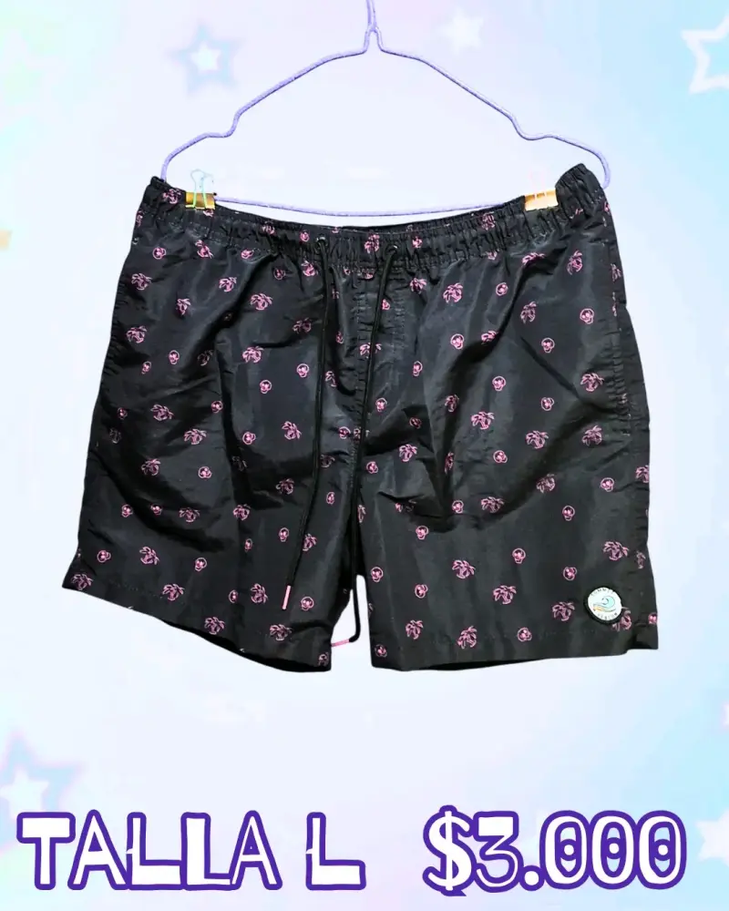 Shorts de baño negros con estampado de calaveras