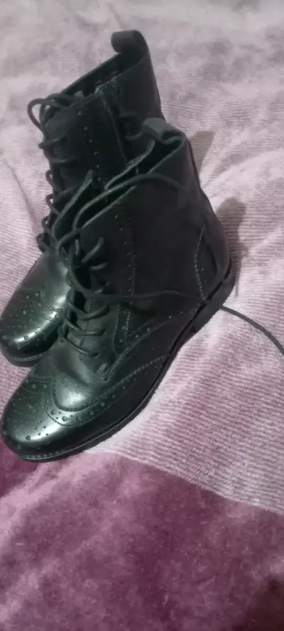 Botines negros de cuero con cordones - miniatura 1