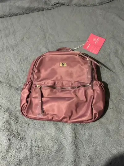 Mochila rosada con diseño elegante - miniatura 1