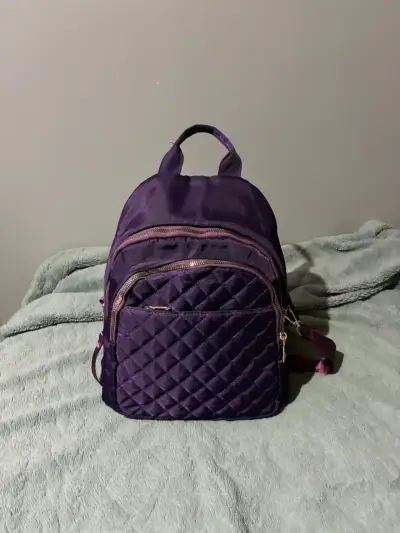 Mochila morada acolchada con múltiples bolsillos - miniatura 1