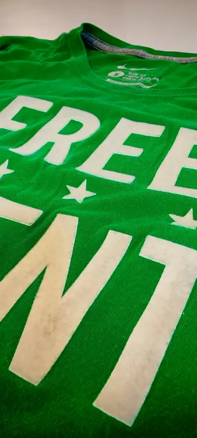 Polera Nike verde con estampado 'Free Agent' - miniatura 2