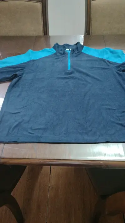 Polerón deportivo azul con cierre - miniatura 1