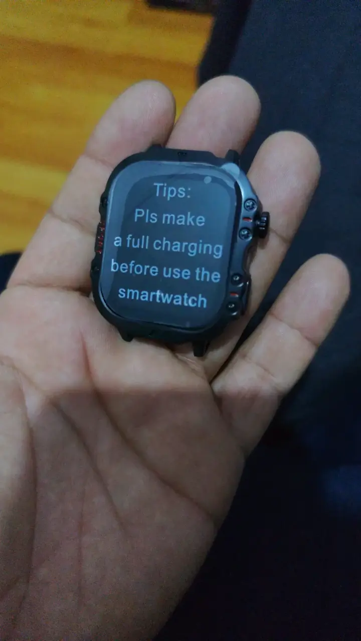 Smartwatch con correa negra y cargador - 3
