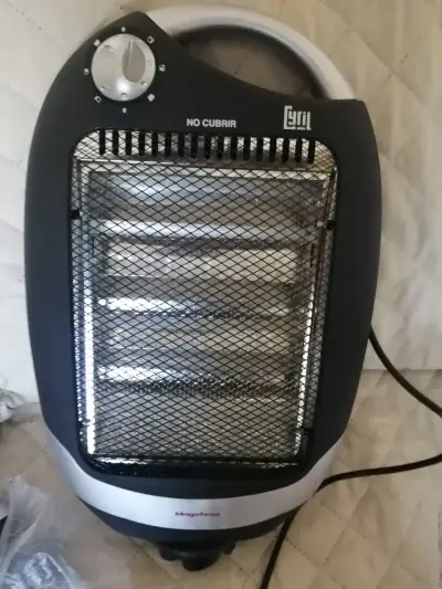 Estufa electrica 1000w, giratoria, nueva , compact - miniatura 1