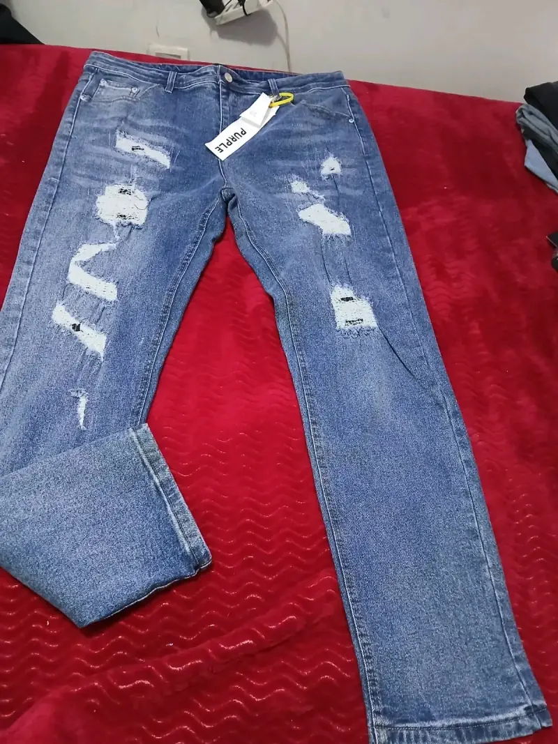 Jeans de mezclilla rasgados para hombre - 1