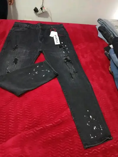 Jeans de mezclilla rasgados para hombre - miniatura 5