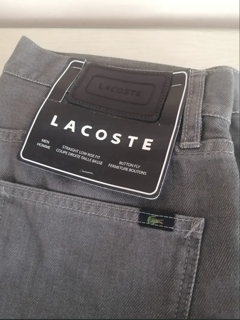 Jeans grises para hombre Lacoste, nuevos ,slim - 1