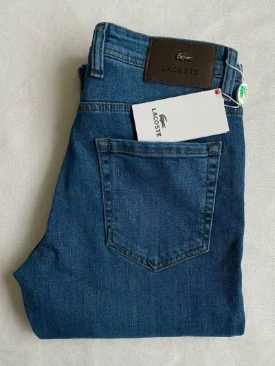 Jeans de mezclilla azul Lacoste para hombre. Nuevo - miniatura 2
