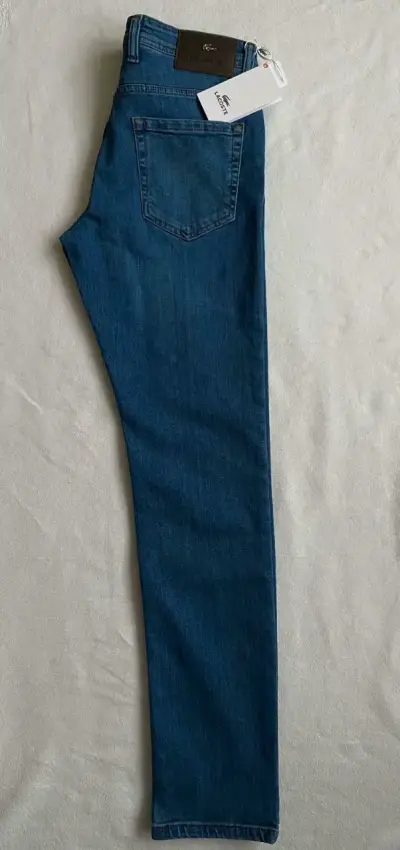 Jeans de mezclilla azul Lacoste para hombre. Nuevo - miniatura 3