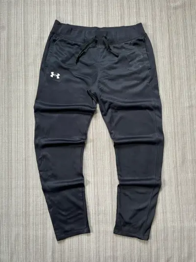 Pantalones deportivos negros Under Armour - miniatura 1