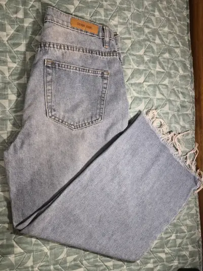 Jeans de mezclilla azul claro con flecos - miniatura 2