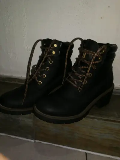 Botas de cuero negras para mujer CAT - miniatura 1