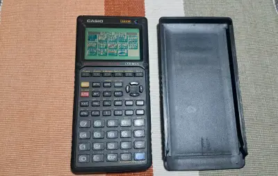 Calculadora gráfica Casio CFX-9850G con tapa - miniatura 1