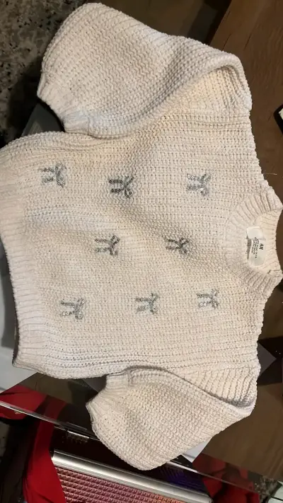 Suéter de punto blanco con lazos H&M - miniatura 1