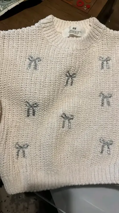 Suéter de punto blanco con lazos H&M - miniatura 2