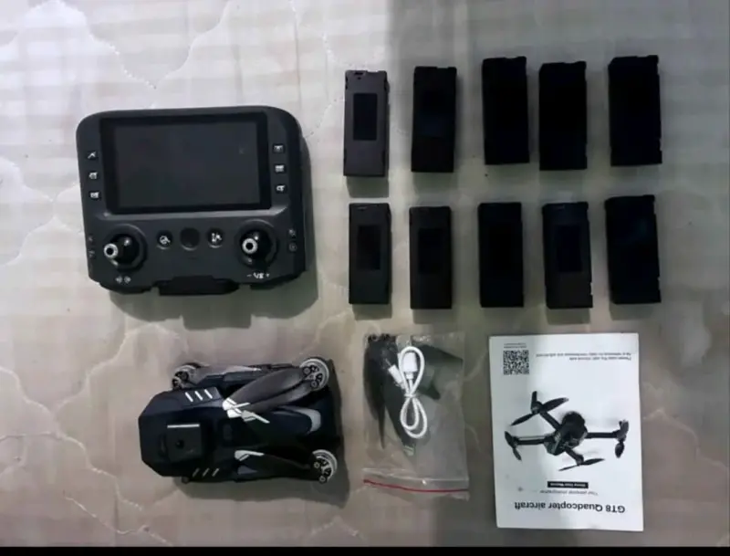 Drone con control remoto y baterías adicionales - 1