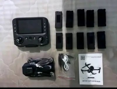 Drone con control remoto y baterías adicionales - miniatura 1