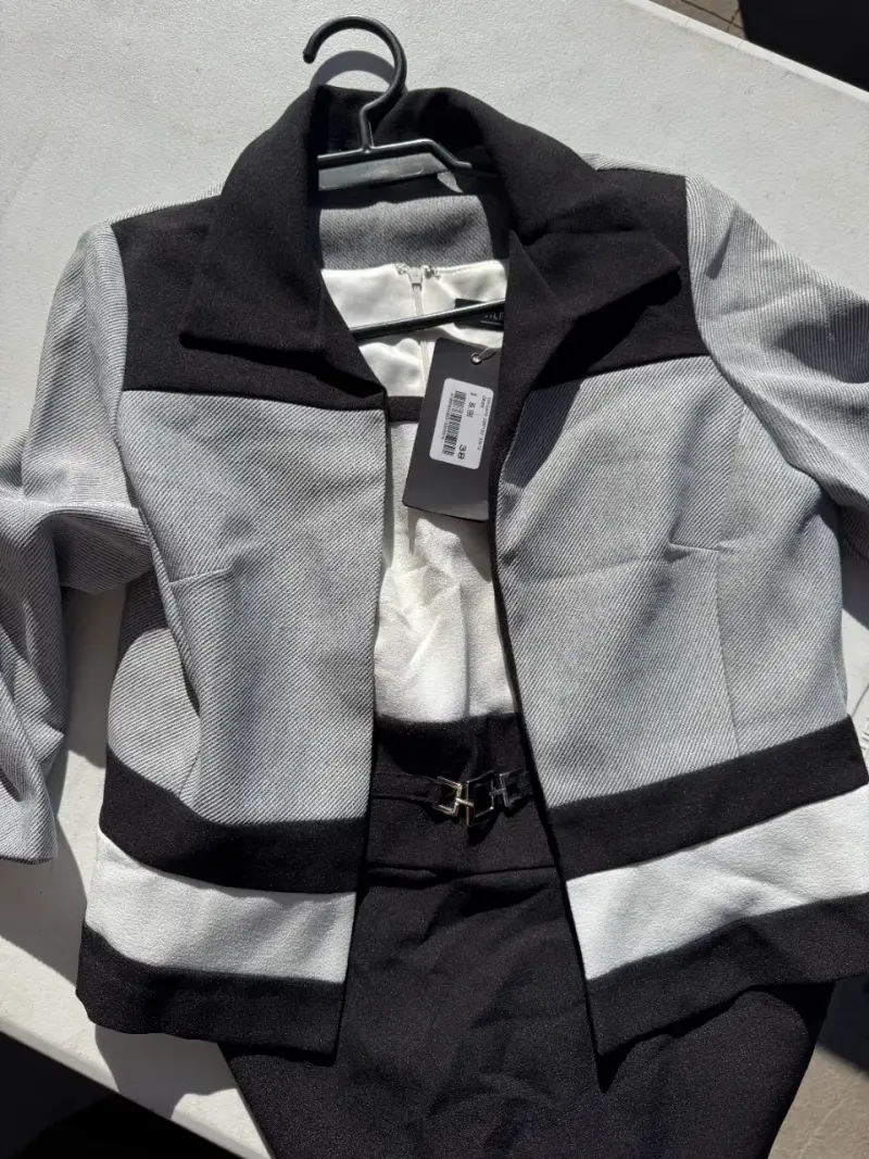 Conjunto de chaqueta y falda en blanco y negro