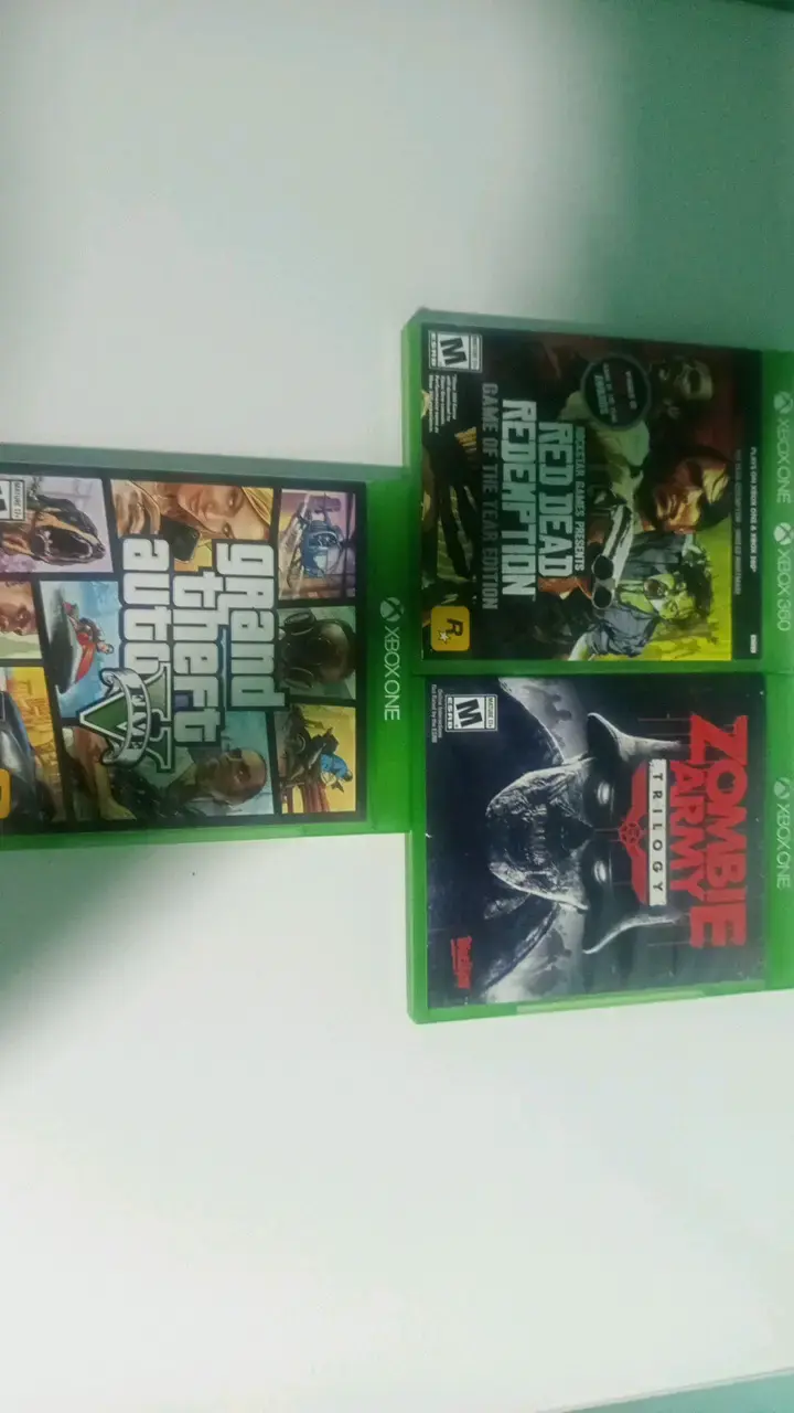 Lote de juegos Xbox One: GTA V, Zombie army y rdr