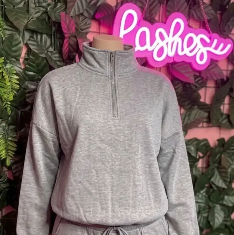 Polerón gris con cierre medio para mujer