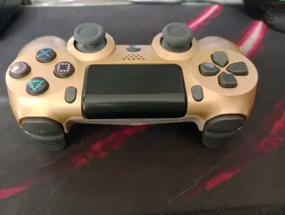 Control inalámbrico dorado para PS4 generico - miniatura 1