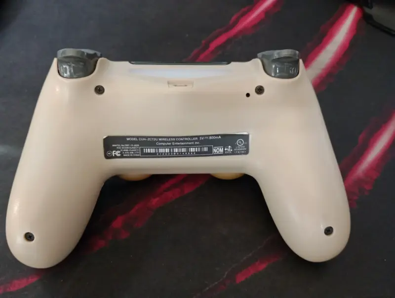 Control inalámbrico dorado para PS4 generico - 2