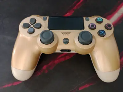 Control inalámbrico dorado para PS4 generico - miniatura 3