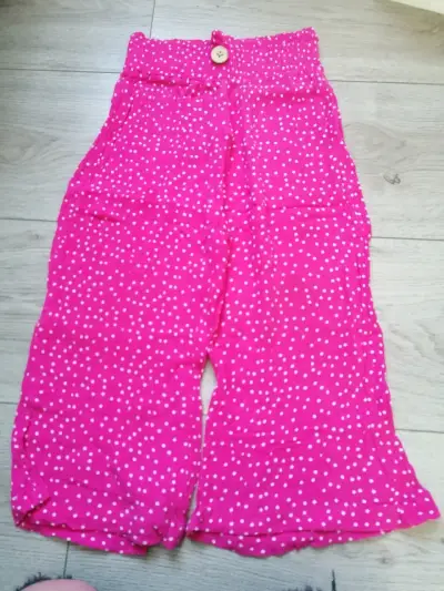 Pantalones de niña con lunares rosados y negros - miniatura 2