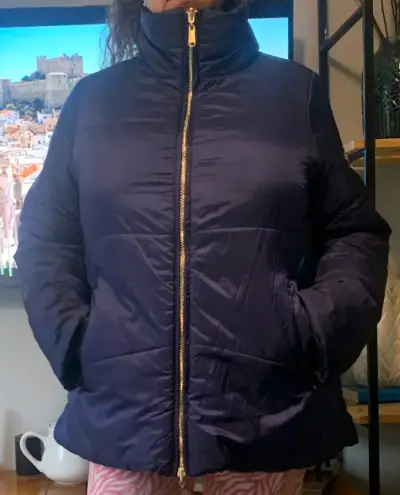 Chaqueta acolchada azul marino con cierre dorado - miniatura 1