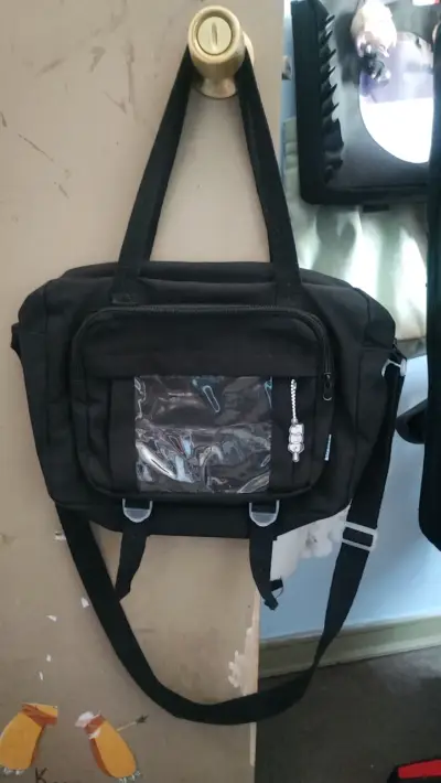 Bolso negro con bolsillo transparente - miniatura 2