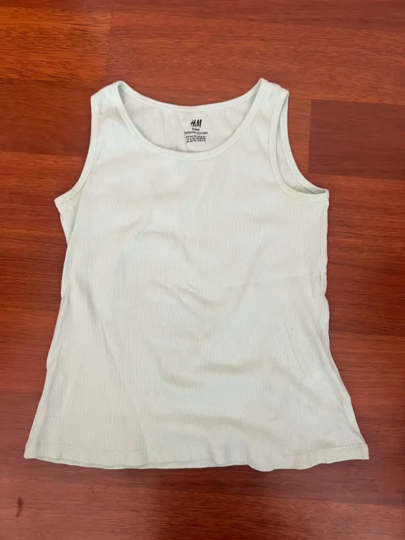 Polera sin mangas H&M de algodón orgánico - 1
