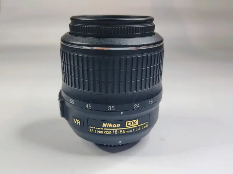 Lente Nikon DX 18-55mm VR para cámaras - 1