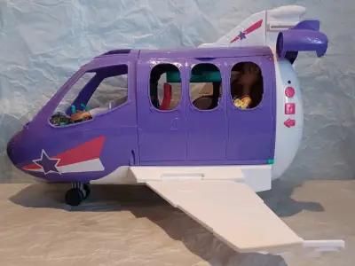 Avión de juguete grande color morado con detalles - miniatura 1