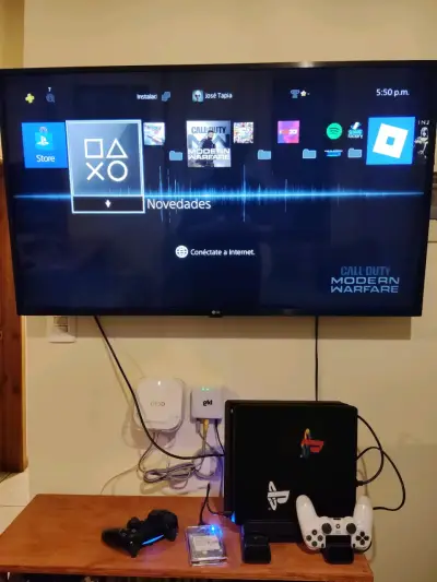 Consola PlayStation 4 con dos controles y disco duro - miniatura 3