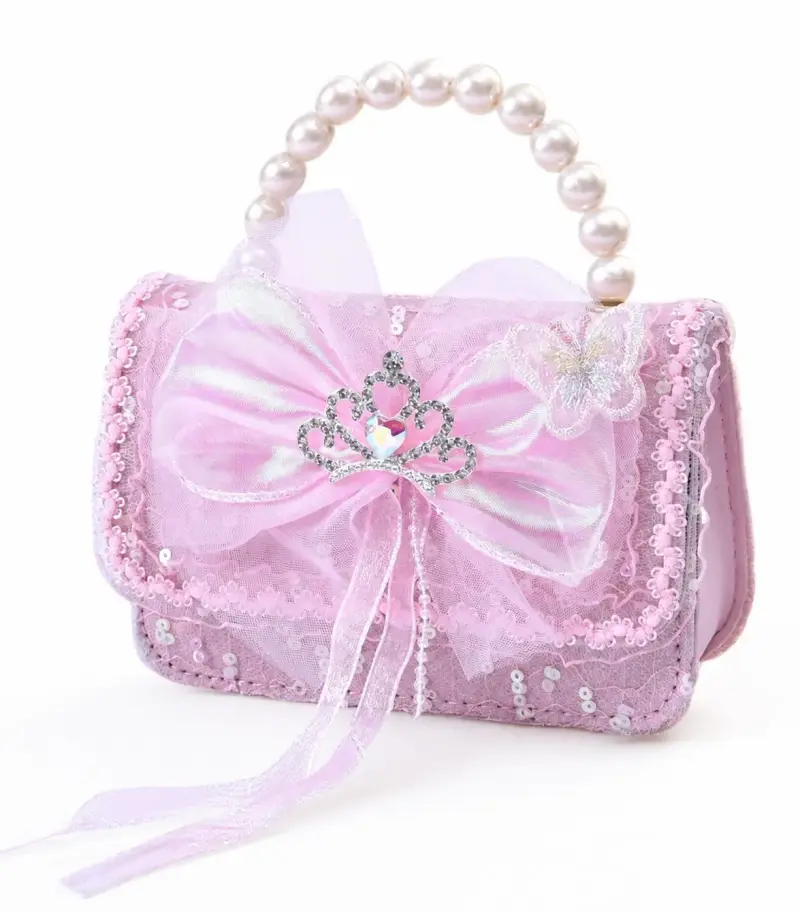 Cartera infantil rosa con lazo y perlas - 1