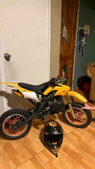 Mini moto cross amarilla para niños - miniatura 1