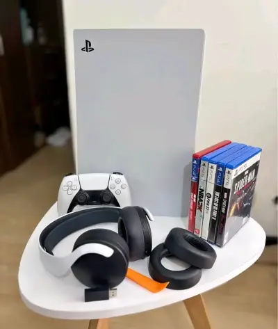 Consola PlayStation 5 con juegos y accesorios - miniatura 1