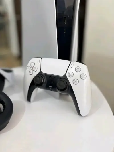 Consola PlayStation 5 con juegos y accesorios - miniatura 4