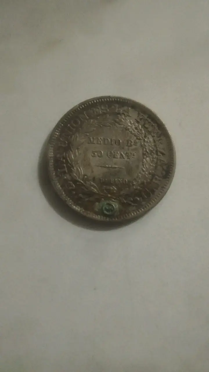 Moneda antigua de medio boliviano - 1
