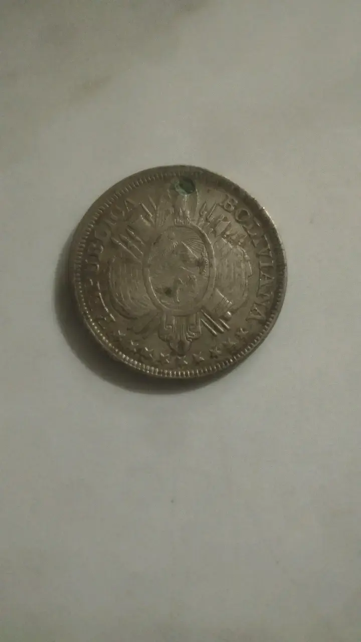 Moneda antigua de medio boliviano - 2