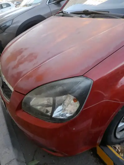 Auto Kia Rio rojo en buen estado año 2011 - miniatura 4