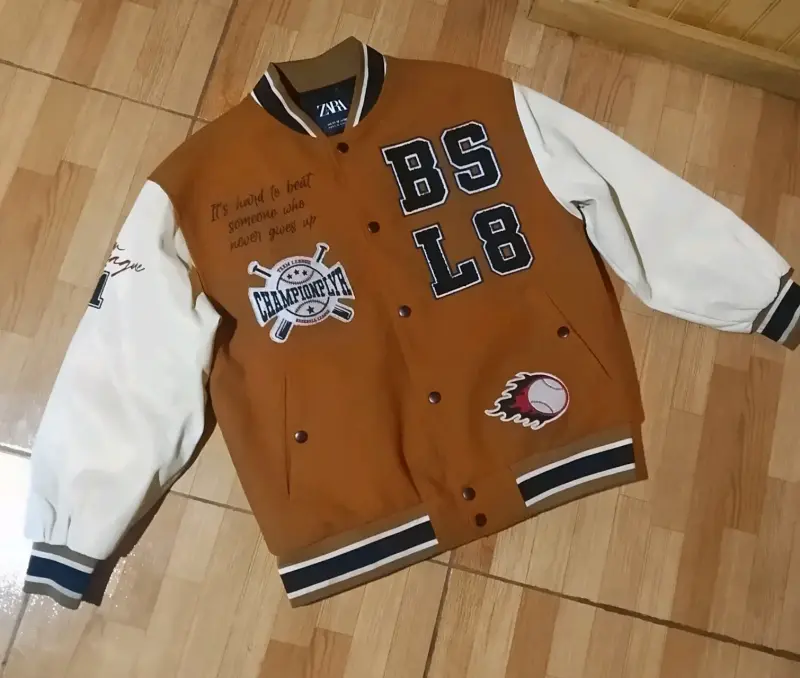 Chaqueta estilo university marrón y blanca Zara - 1