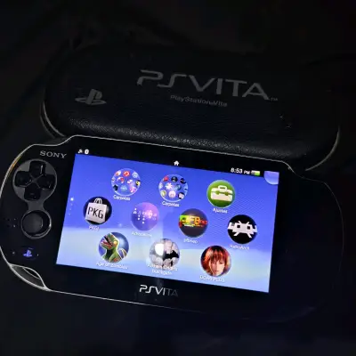 Consola portátil Sony PS Vita con funda, cargador. - miniatura 1