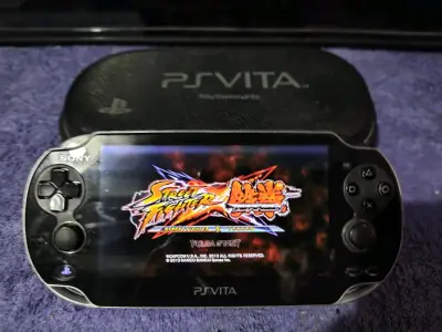 Consola portátil Sony PS Vita con funda, cargador. - miniatura 3