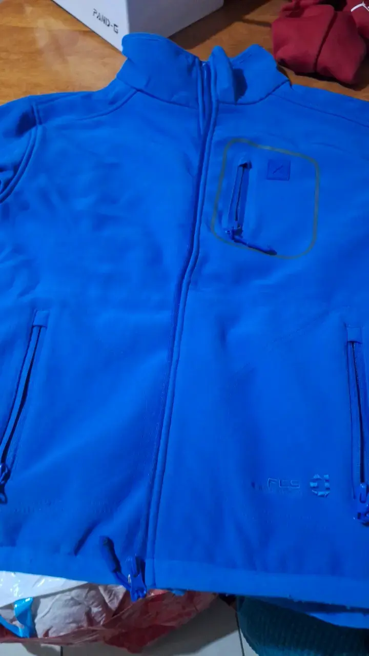 Chaqueta polar azul con cierre y bolsillos - 1