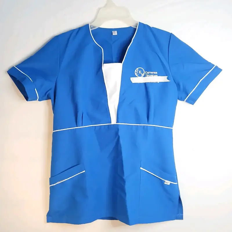 Uniforme médico azul con detalles blancos - 1
